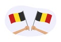 Belgium waving flag icon or badge. Hand holding Belgian flags. Vector illustration. Royalty Free Stock Photo